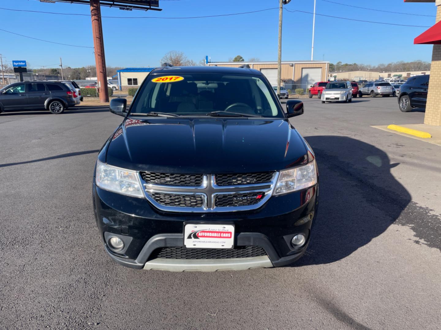 2017 Black Dodge Journey (3C4PDCBGXHT) with an V6, 3.6 Liter engine, Auto, 6-Spd AutoStick transmission, located at 8008 Warden Rd, Sherwood, AR, 72120, (501) 801-6100, 34.830078, -92.186684 - Photo#2